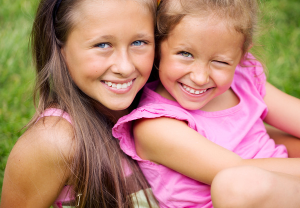 Two smiling little girls Stock Photo