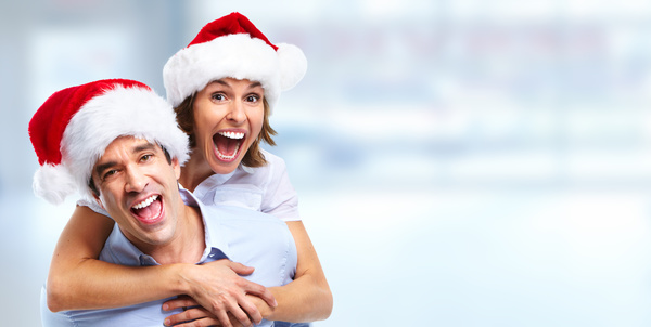 Wearing Christmas hat exaggerated facial expressions couples Stock Photo 01