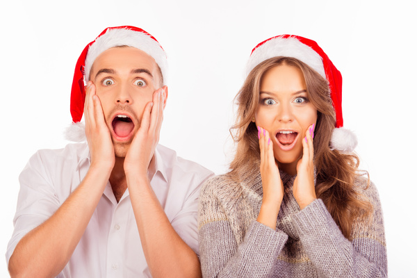 Wearing Christmas hat exaggerated facial expressions couples Stock Photo 02