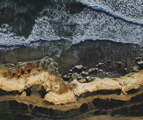 White foam seaside from altitude Stock Photo