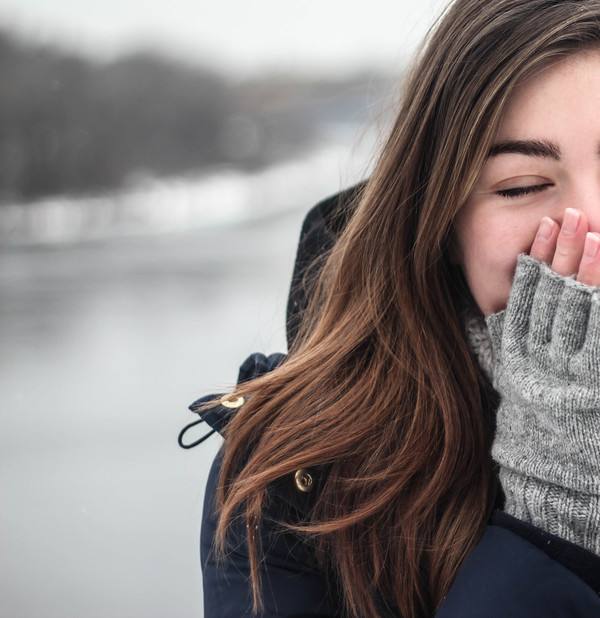 Winter girl in gloves Stock Photo