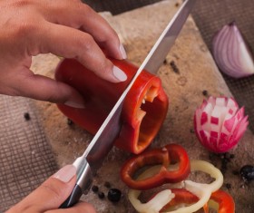 Woman chopping vegetables in the kitchen Stock Photo 04
