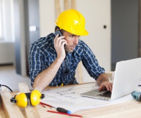 Workers using tablet and cellphone Stock Photo 02