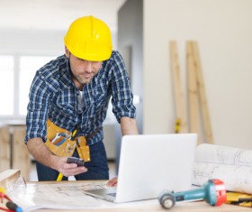 Workers using tablet to find information Stock Photo 01