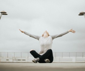 Young woman posing with free style gesture Stock Photo