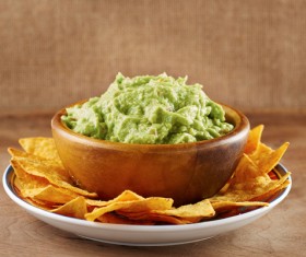 avocado sauce and fried corn flakes on the plate Stock Photo