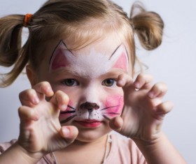 little girl dressed as kitten Stock Photo