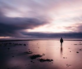 man in front of empty beach Stock Photo