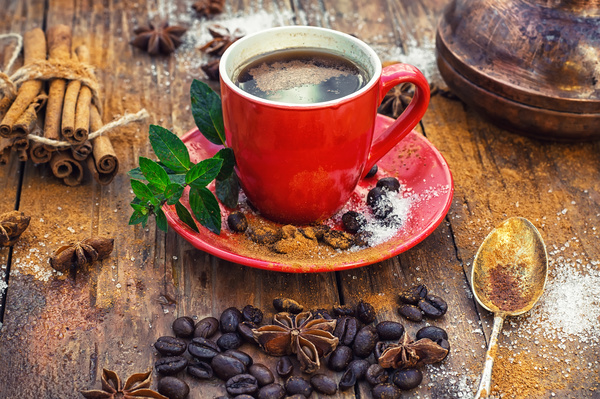 A cup of fragrant coffee and coffee beans Stock Photo 01