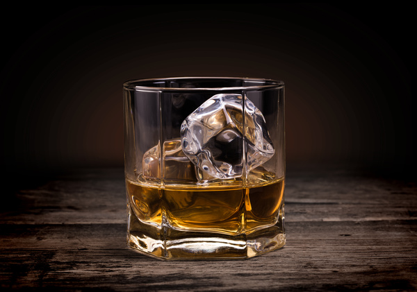 Add ice scotch whiskey Stock Photo