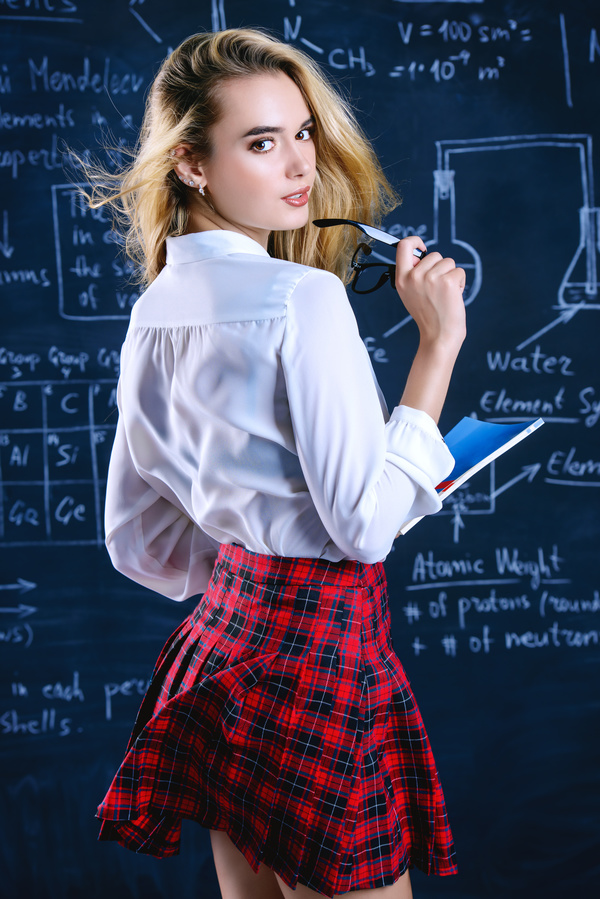 Beautiful college girl in front of blackboard Stock Photo 05