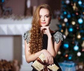 Beautiful elegant lady holding a gift box Stock Photo 01