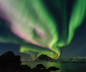 Calm aurora on the lake Stock Photo
