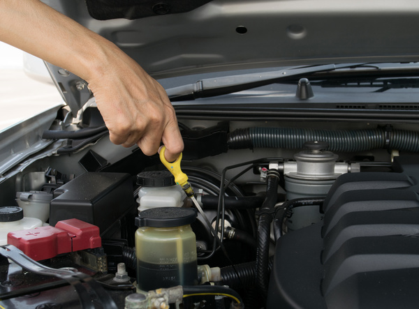Car oil inspection Stock Photo