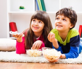 Children watching TV Stock Photo