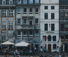 Classical architectures in crowded town Stock Photo