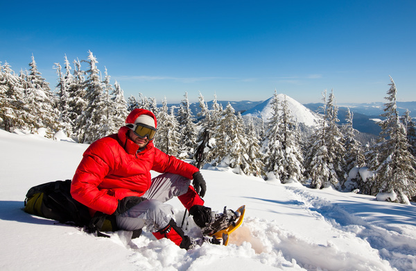 Climber resting on the snow Stock Photo 01