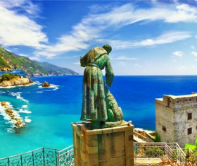 Coast stands the statue Stock Photo