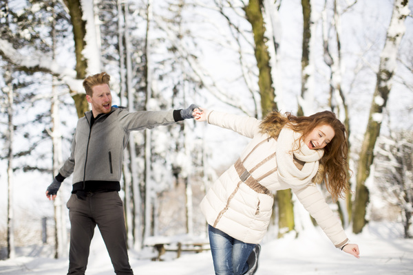 Couple having fun outdoors in winter Stock Photo 02