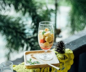 Delicious healthy fruits desert in wineglass Stock Photo