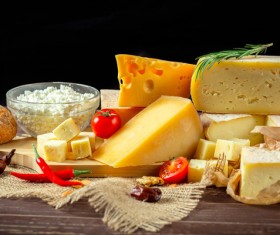 Different sorts of cheese on wooden table Stock Photo 02