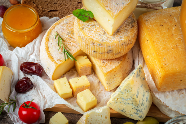 Different sorts of cheese on wooden table Stock Photo 03