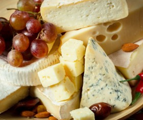 Different sorts of cheese on wooden table Stock Photo 05