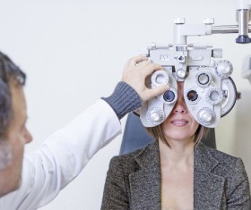 Do the eye exam lady Stock Photo