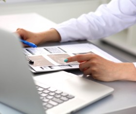 Doctor using laptop Stock Photo 03