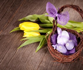 Easter eggs and flowers in the desktop basket Stock Photo 03