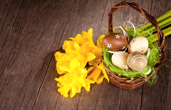 Easter eggs and flowers in the desktop basket Stock Photo 04
