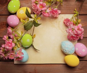 Easter eggs and flowers on the desktop Stock Photo 01