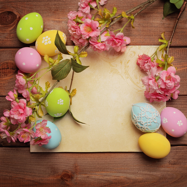 Easter eggs and flowers on the desktop Stock Photo 01