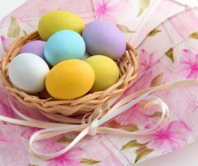 Easter eggs in the desktop basket Stock Photo