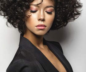 Fashion curly hair woman in black suit Stock Photo 02