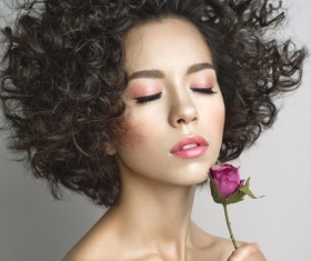 Fashion curly woman with rose flower Stock Photo 02