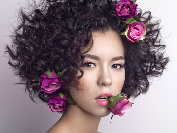 Fashion curly woman with rose flower Stock Photo 03