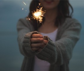 Fireworks in the hands Stock Photo