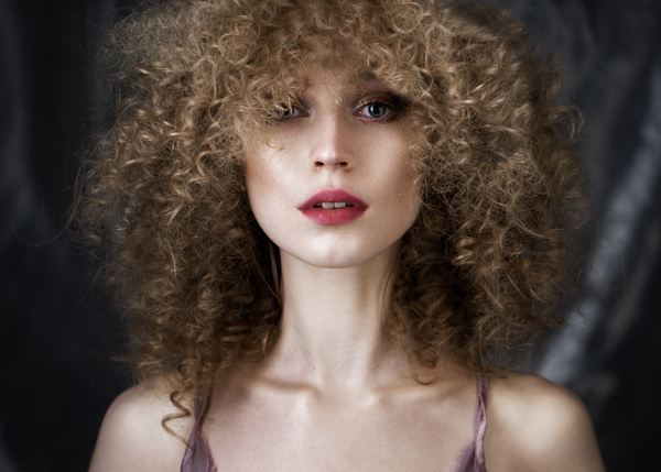Fluffy curly hair woman Stock Photo