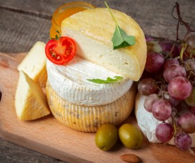 Fruit and cheese on the desktop Stock Photo