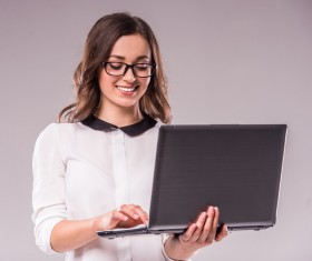 Girl using using laptop Stock Photo
