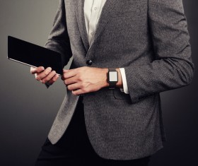 Handsome young man in business suit holding tablet PC Stock Photo 03
