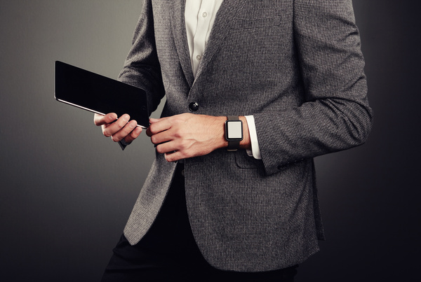 Handsome young man in business suit holding tablet PC Stock Photo 03