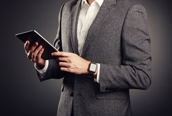 Handsome young man in business suit holding tablet PC Stock Photo 04