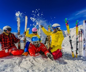 Happy family holiday skiing Stock Photo