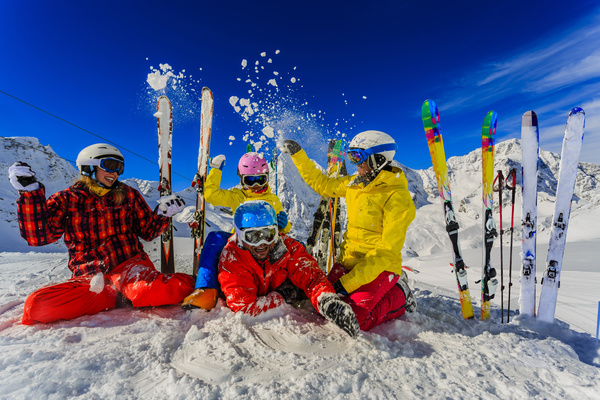 Happy family holiday skiing Stock Photo