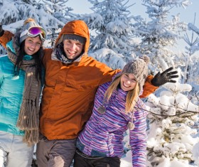 Happy friends outdoors in winter photo Stock Photo