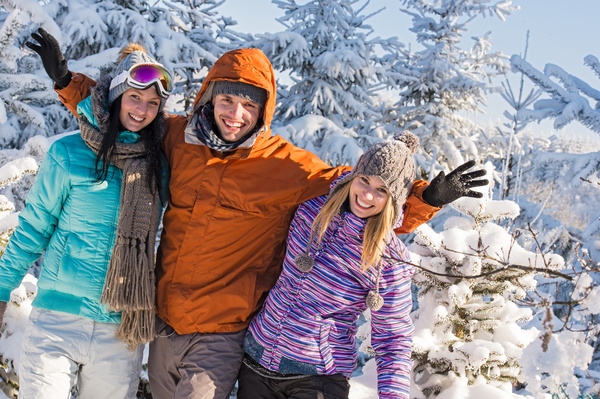 Happy friends outdoors in winter photo Stock Photo