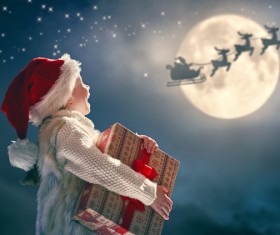 Happy girl holding Christmas gift Stock Photo 01