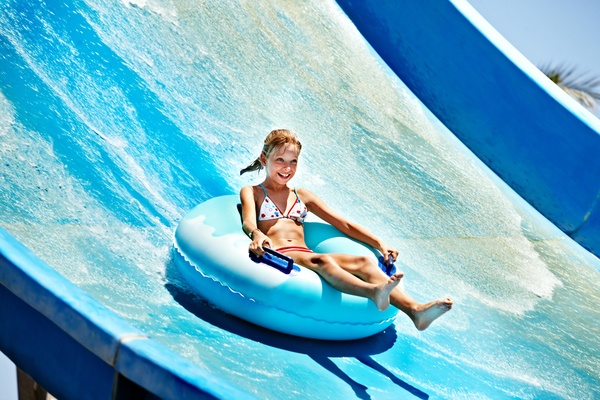 Happy little girl playing in water amusement park Stock Photo 03